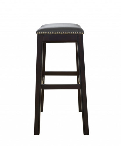 26" Gray and Espresso Faux Leather and Solid Wood Backless Counter Height Bar Chair-3