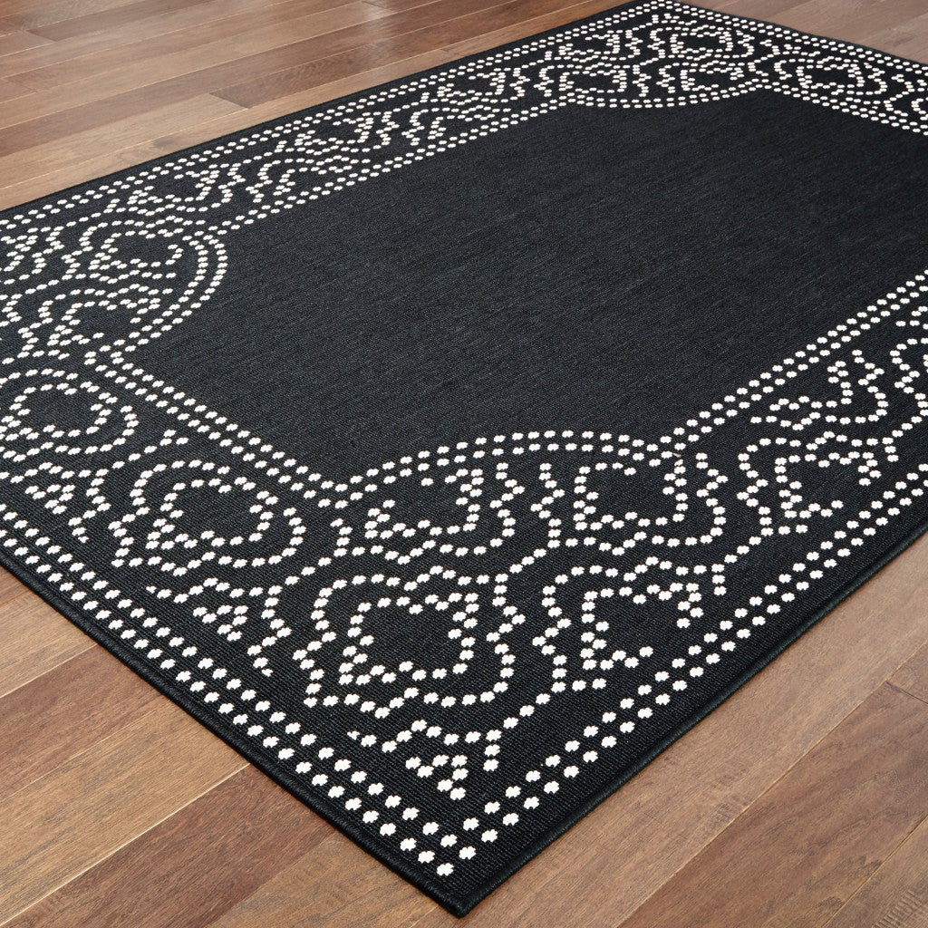 8' X 11' Black and Ivory Stain Resistant Indoor Outdoor Area Rug-3