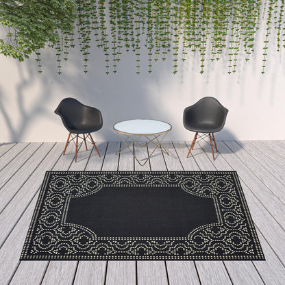 8' X 11' Black and Ivory Stain Resistant Indoor Outdoor Area Rug-1