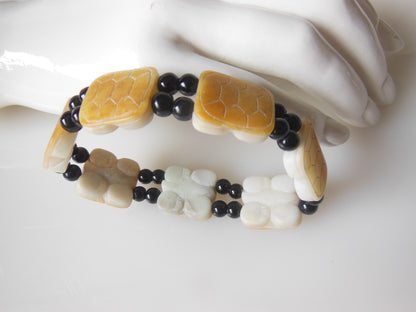 Jade bracelet. Black round jade with golden square jade beads-3